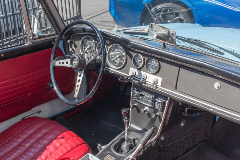 Fuller’s personal 1967 Datsun 2000 Roadster. He kept the restoration as close to stock as possible, but he did replace the Panasports with freshly some powdercoated steelies and whitewalls tires.